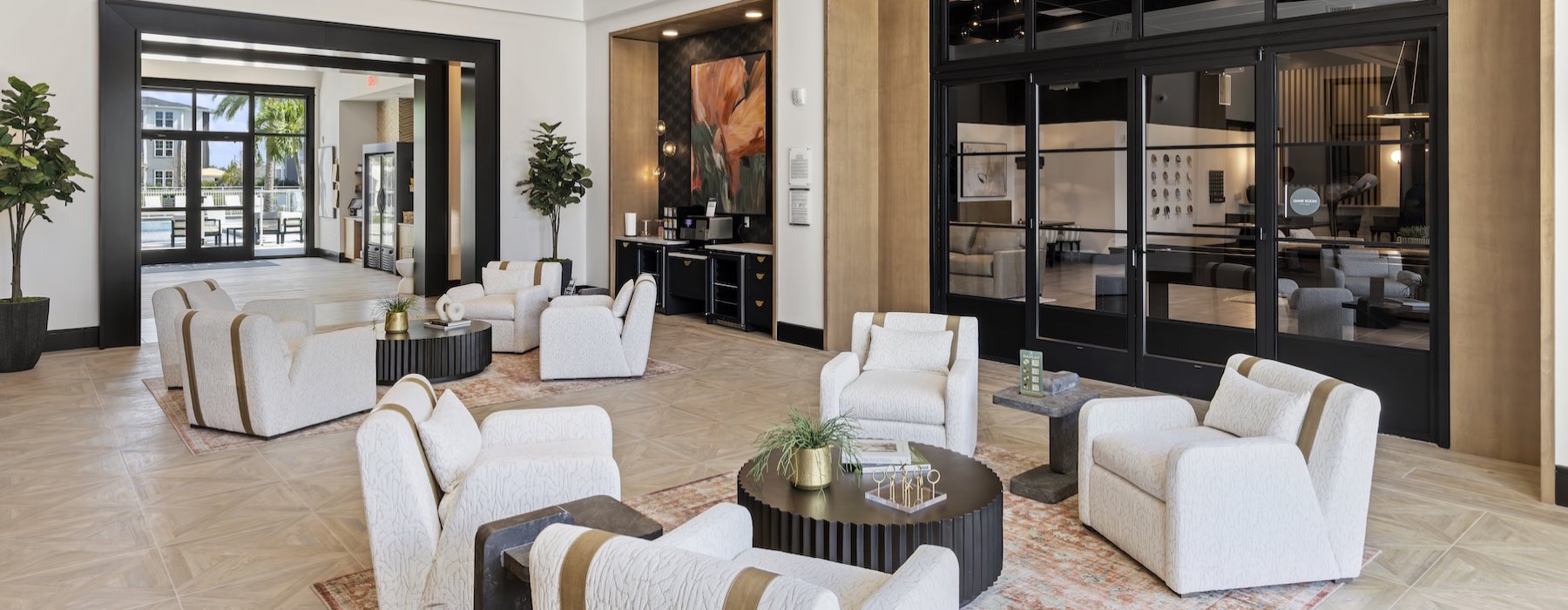 a clubroom with tables and chairs