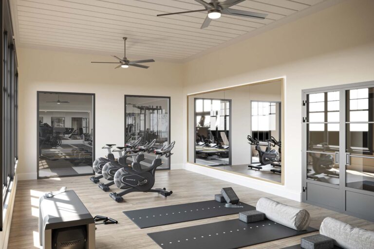 exercise room with spin bikes and yoga mats